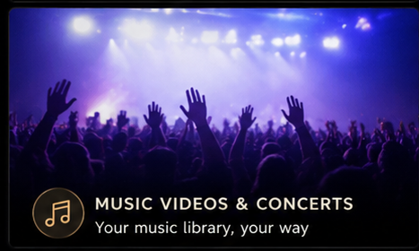 Concert crowd with raised hands under purple stage lighting.